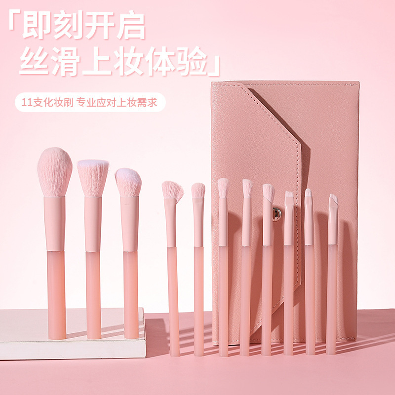 新しい11本の長い柄の蜜桃の粉の頬紅は顔の化粧の道具のアイシャドーのブラシを塗って傷のファンデーションの化粧のブラシのセットを覆います。|undefined