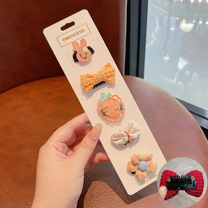 Hermosos clips de cabello de color para niños coreanos de alto nivel sensación de arco de niñas bolsa de tela no daña clips de cabello de bebé