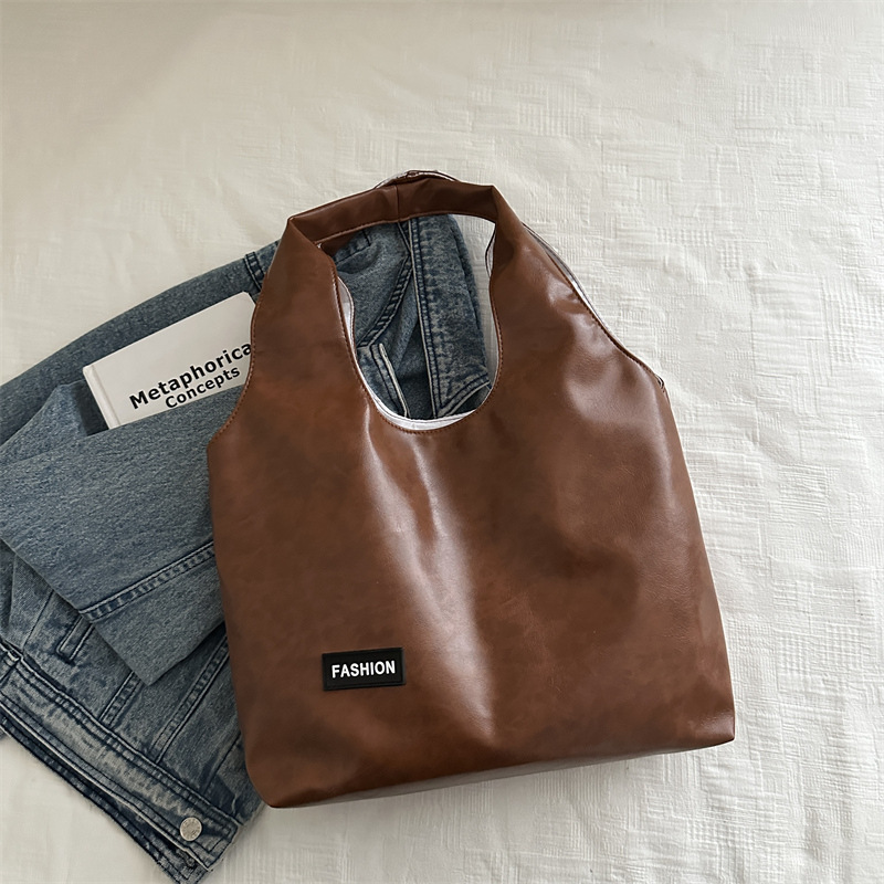 Bolsa de brazo retro nicho para mujeres 2024 otoño y invierno nueva moda coreana bolso de hombro de gran capacidad