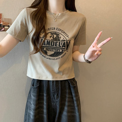 アメリカのレトロな肩の半袖のtシャツの女性の夏の半袖の2025年の新型のtシャツのファッションの修身の短い上着