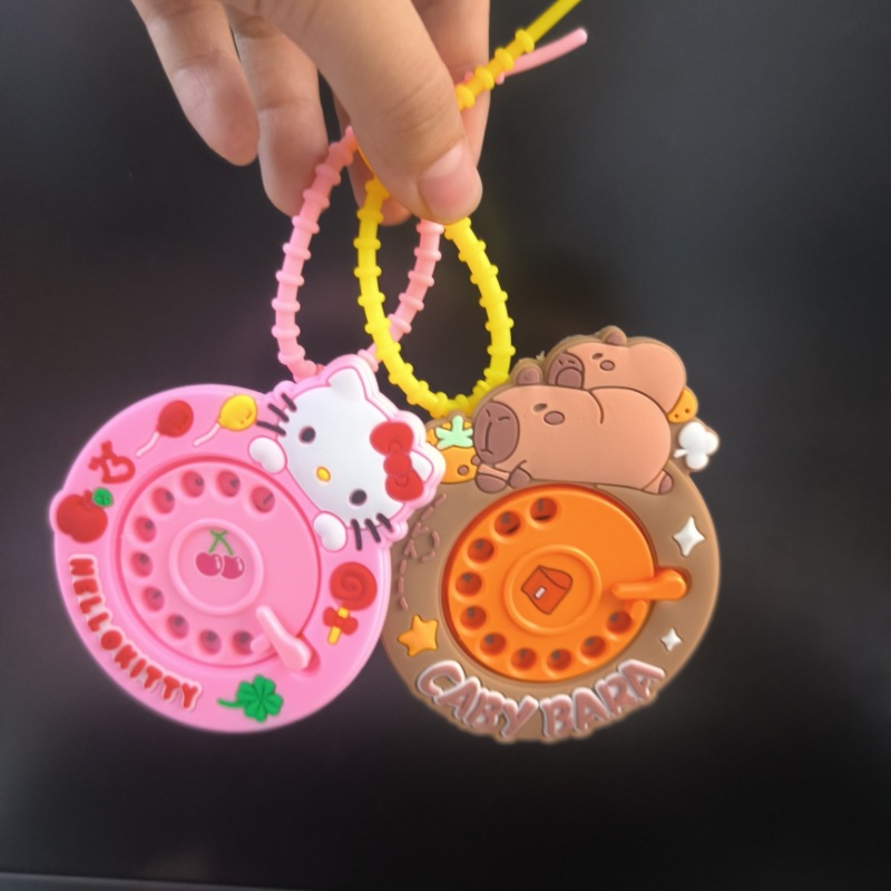 Celebridades de Internet dibujos animados divertidos animales lindos manivela descompresión teléfono niños estudiantes mochila colgante pequeño regalo al por mayor