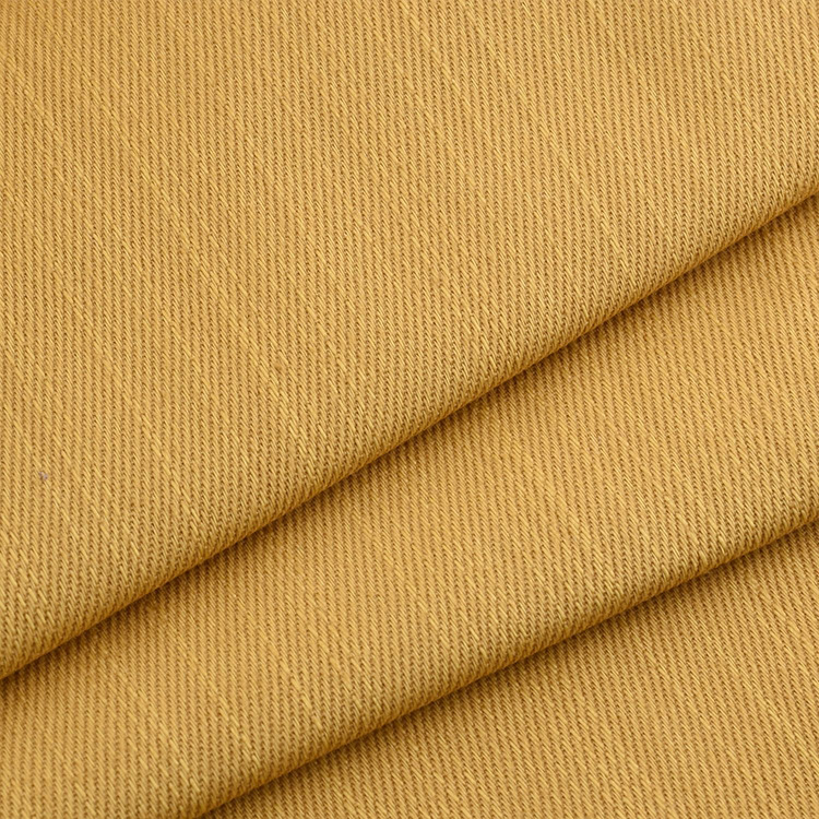 Fabricante al por mayor 100% tejido de algodón orgánico de color sólido pantalones de ropa