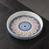 Blue and white underglaze pot holder with curly grass pattern