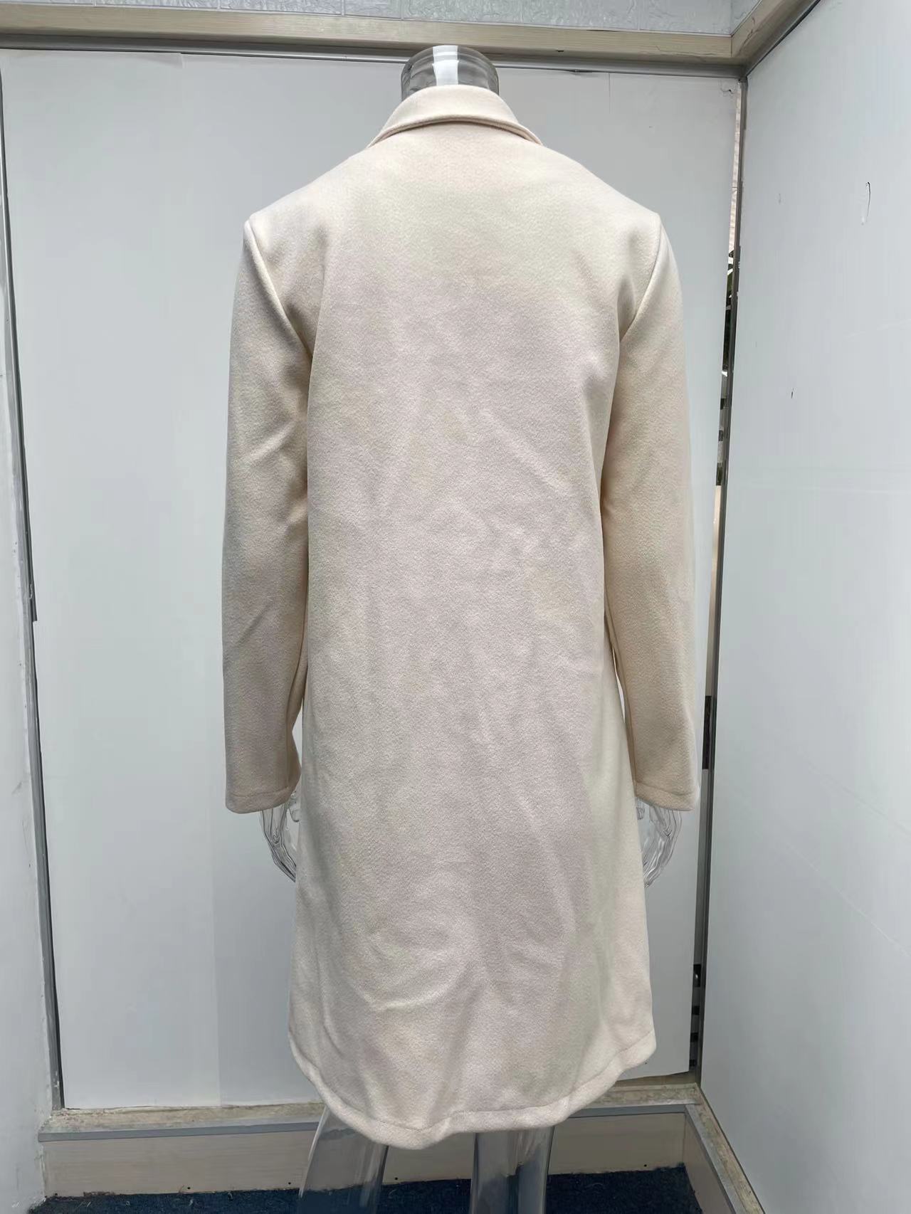 Title 10, Mid-length coat with solid lapels. Classic styl...