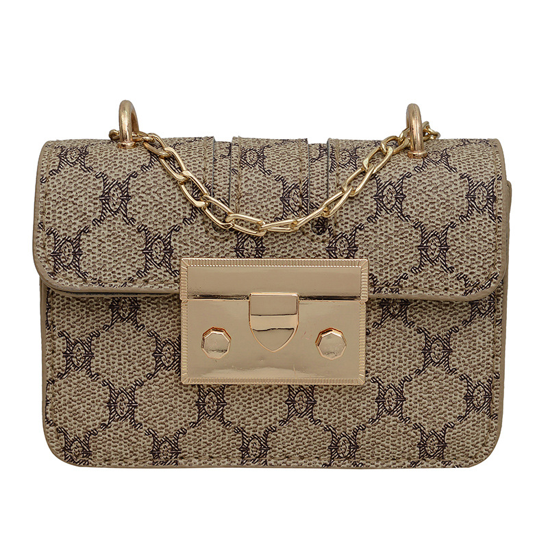 Commuting mini lápiz labial bolso de mano primavera y verano 2023 nueva cadena de moda bolso de hombro impresión retrógrada oblicuo bolso de tendencia