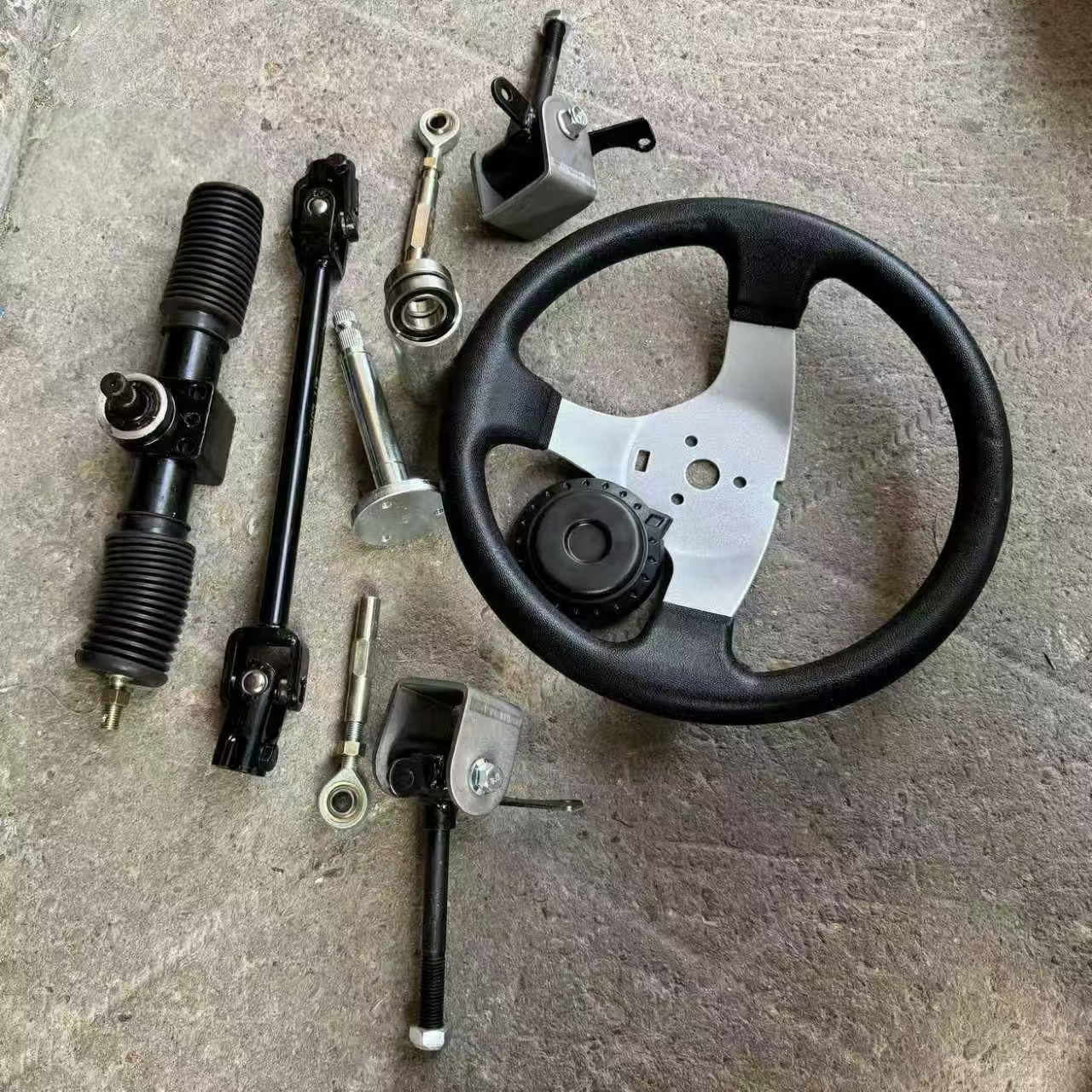 Four-wheel electric motorcycle kart accessories: aluminum steering gear, steering linkage, ball joint, and steering knuckle for beach vehicles