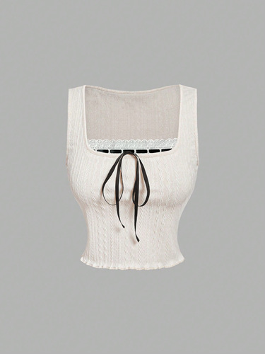 Elegant women's lace-trimmed, slim-fit, V-neck top in a milky white tone, exuding sweet, gentle, and charming temperament.