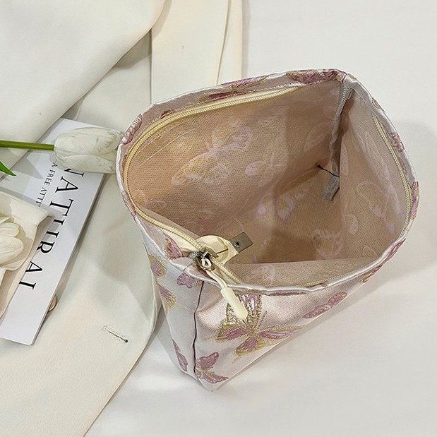 Bolsa de maquillaje de mariposa transfronteriza pequeña bolsa fresca portátil de cuidado de la piel bolsa de almacenamiento bolsa de lavado de viaje bolsa de lona bolsa de mano