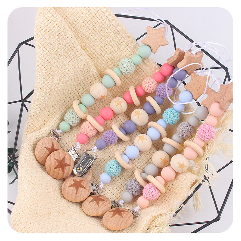 Nuevos productos infantiles de haya Júpiter estrella agujero redondo clips bebés creativos tetas cadena de silicona mordida juguetes a prueba de la cadena