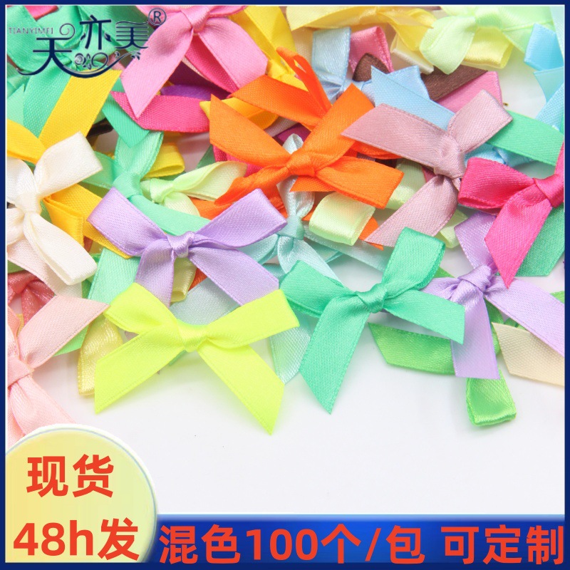 1cm arco de cinta accesorios DIY arco de mano 100 pcs / paquete de piruola arco de decoración