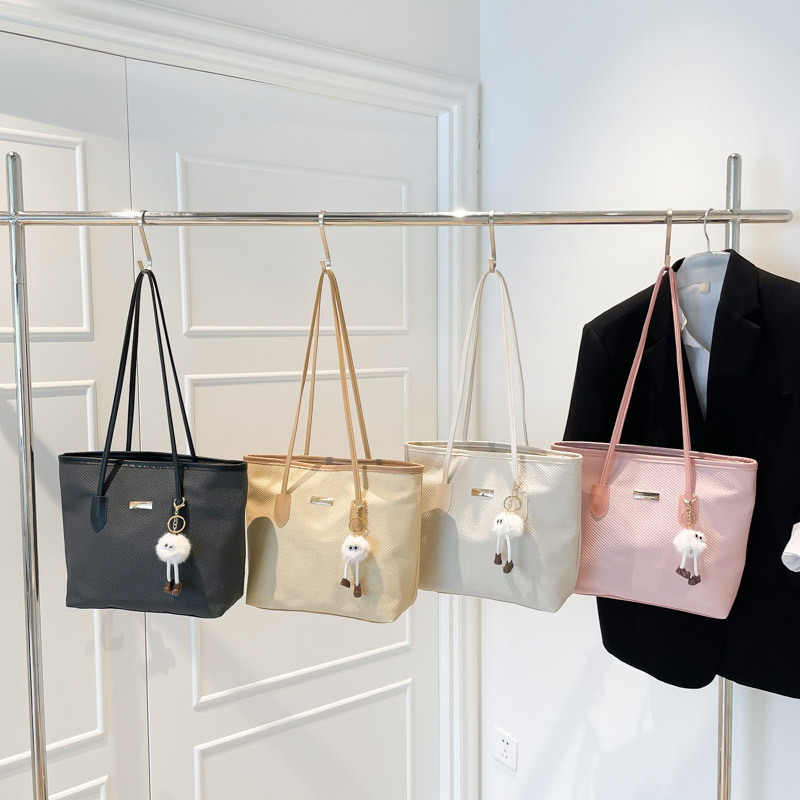 Moda francesa de alta calidad de moda textura bolso universal para mujeres otoño 2025 nueva gran capacidad de viaje bolsa