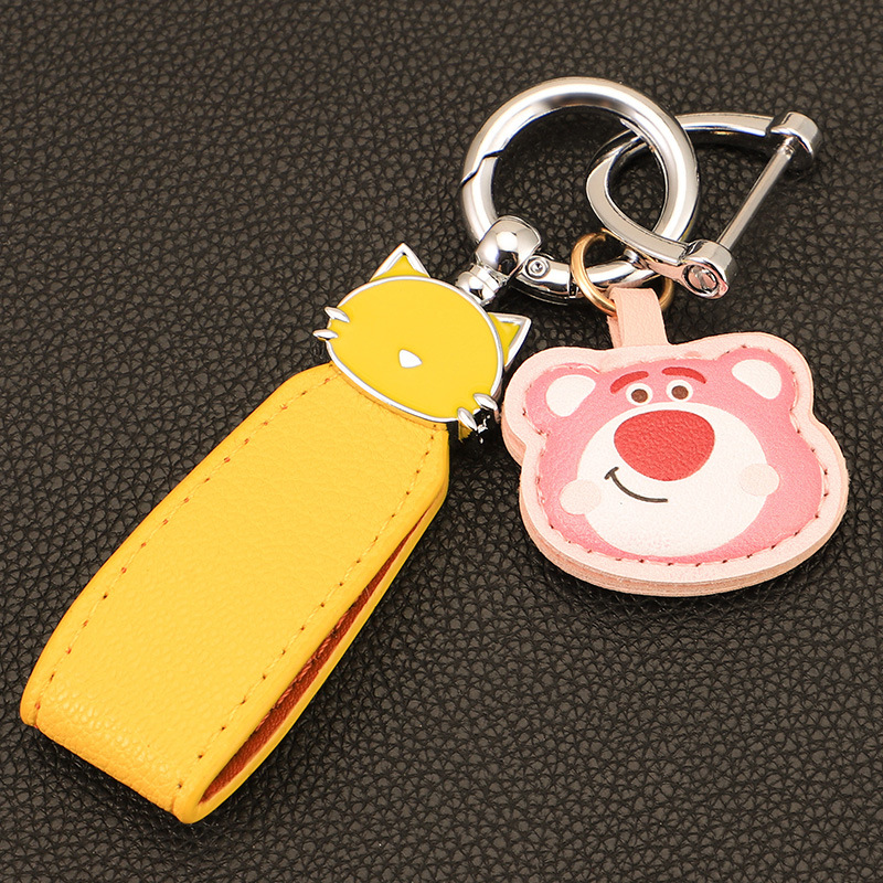 Macaron color gato cuerda de mano llavero de coche colgante de oso de fresa colgante de llavero de oso de cuero de alta calidad colgante de llavero de oso Pooh