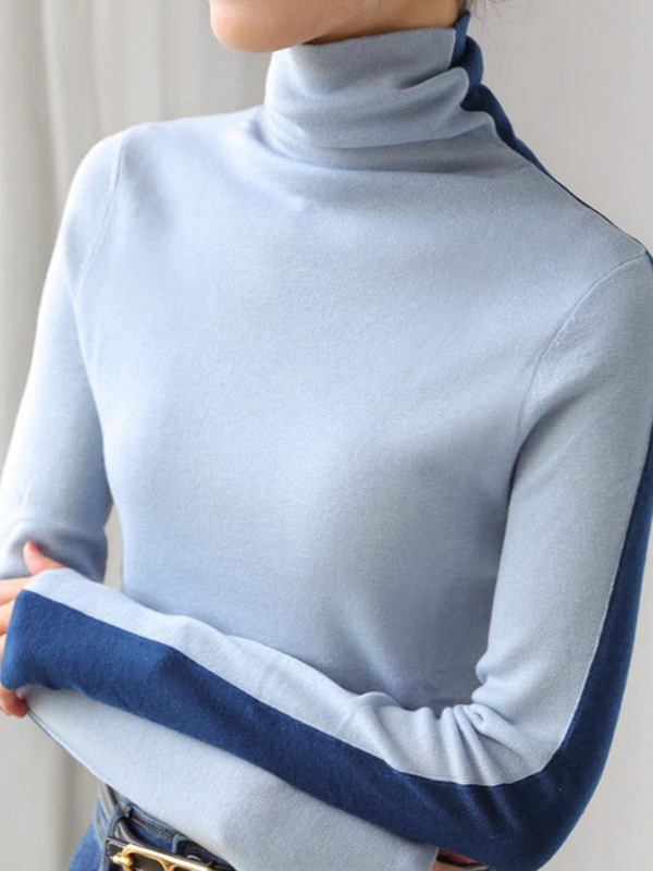 両面にデザイン感のあるウールのニット服を着ています。|undefined