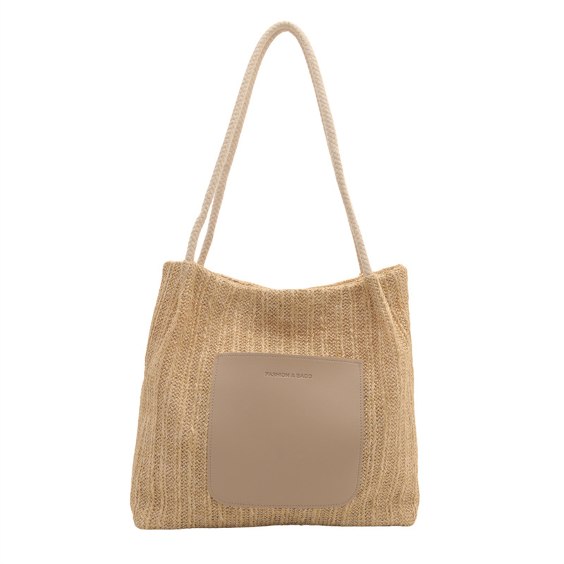 Popular bolsa de tejido de gran capacidad para mujeres 2024 verano nueva bolsa de hombro universal bolsa de viaje de moda