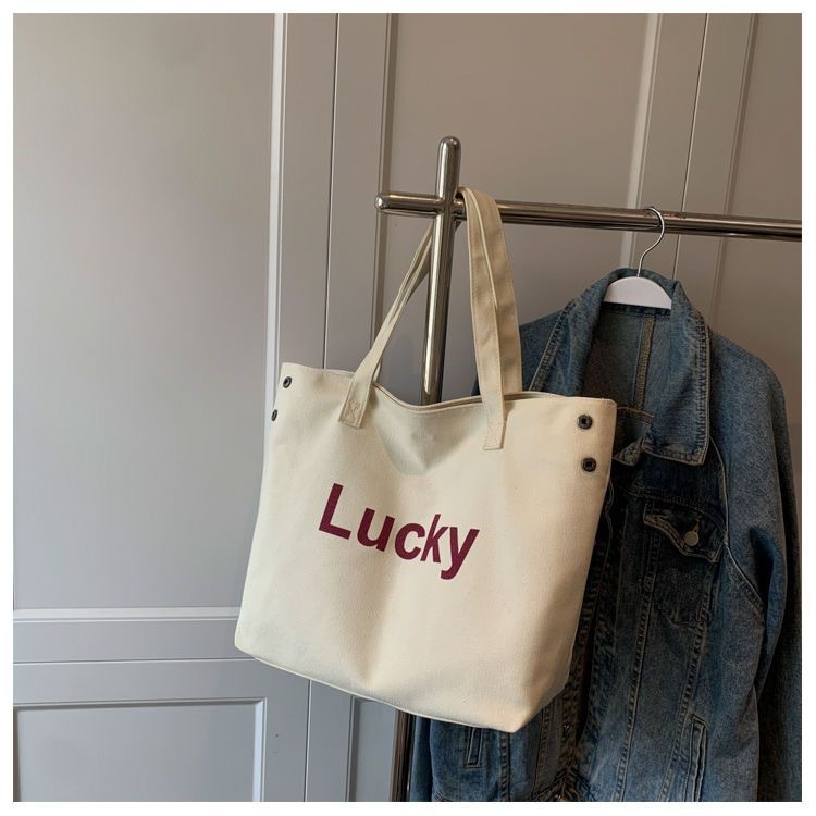 2023 nuevo estilo coreano clásico letras simple bolso de hombro estilo académico bolso casual de gran capacidad