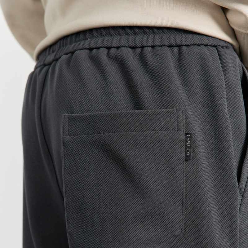 WOOG2005 Pantalones casuales de pierna gris oscuro para hombre 2025 primavera y otoño micro sueltos pantalones deportivos rectos micro elásticos