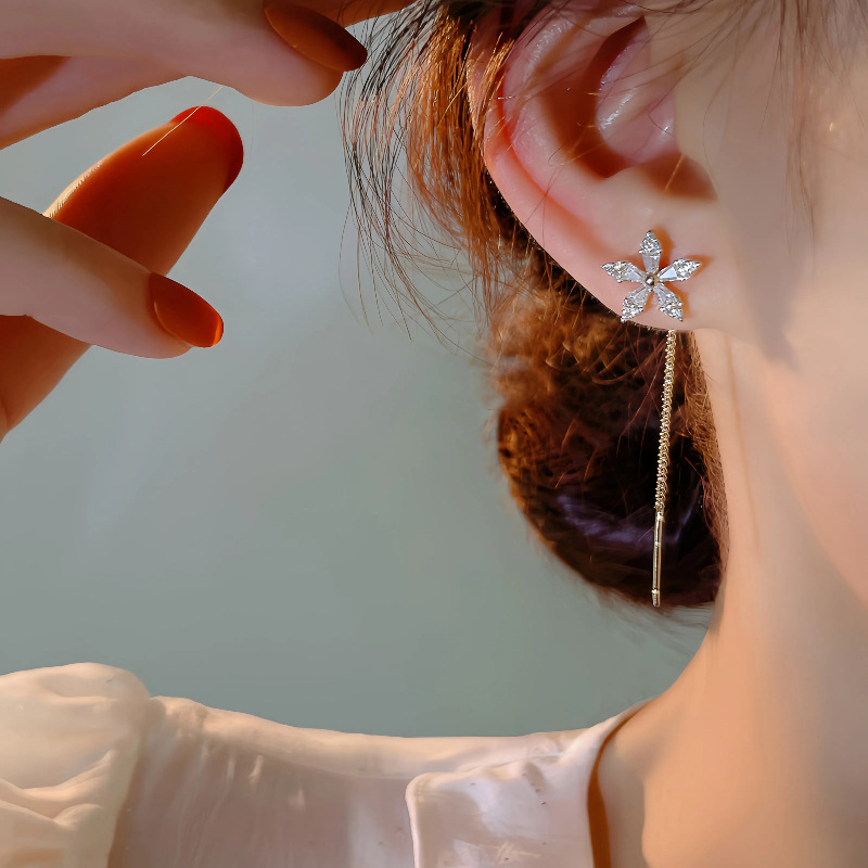 S925 plata esterlina chapado 14K oro cristal flores largas líneas de orejas bordadas nicho femenino diseño de lujo ligero de alto nivel auriculares versátiles