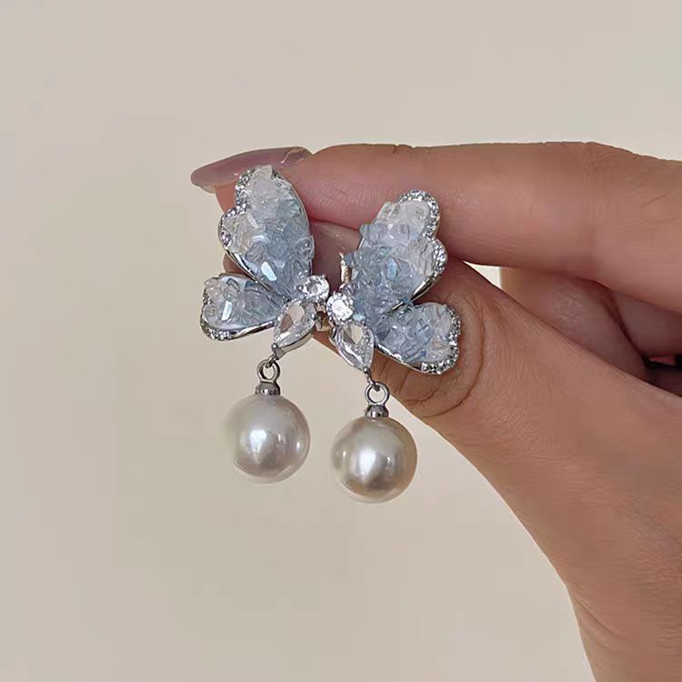 Pendientes de circón súper flash de alta calidad con aguja de plata 925 Pendientes de estilo explosivo de temperamento exquisito de lujo ligero femenino Pendientes de primavera y verano al por mayor