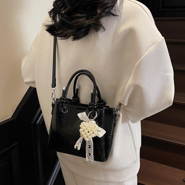 Bolso de mano de tendencia de comercio exterior femenino 2025 nuevo estilo plisado todo-fósforo bolso de hombro retro de alta gama ocio cubo bolso