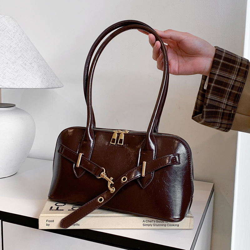 手提复古通勤女士包包2025韩版小众腋下包保龄球包斜挎休闲百搭