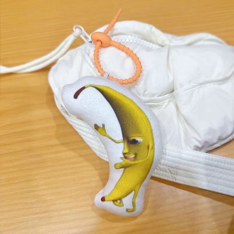 Chatter en línea recomienda cantar gran plátano muñeca emoticon colgante fantasma animal llavero colgante de peluche divertido