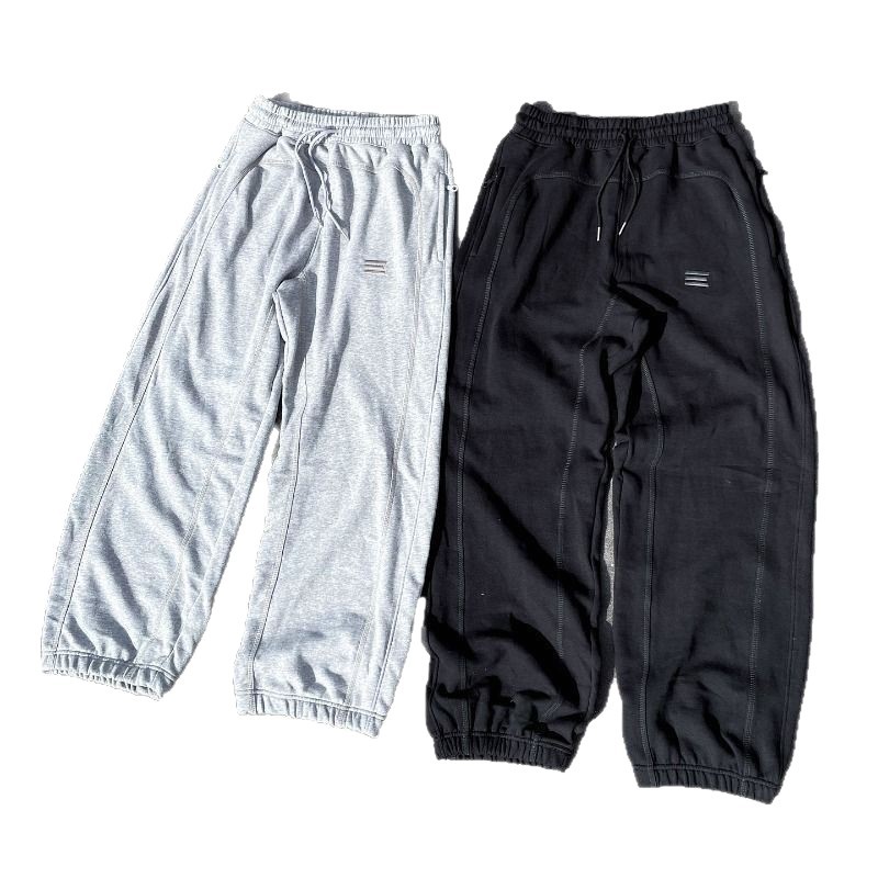 Pantalones deportivos versátiles, holgados e informales unisex, con bordado de estilo hip-hop urbano transfronterizo europeo y americano.
