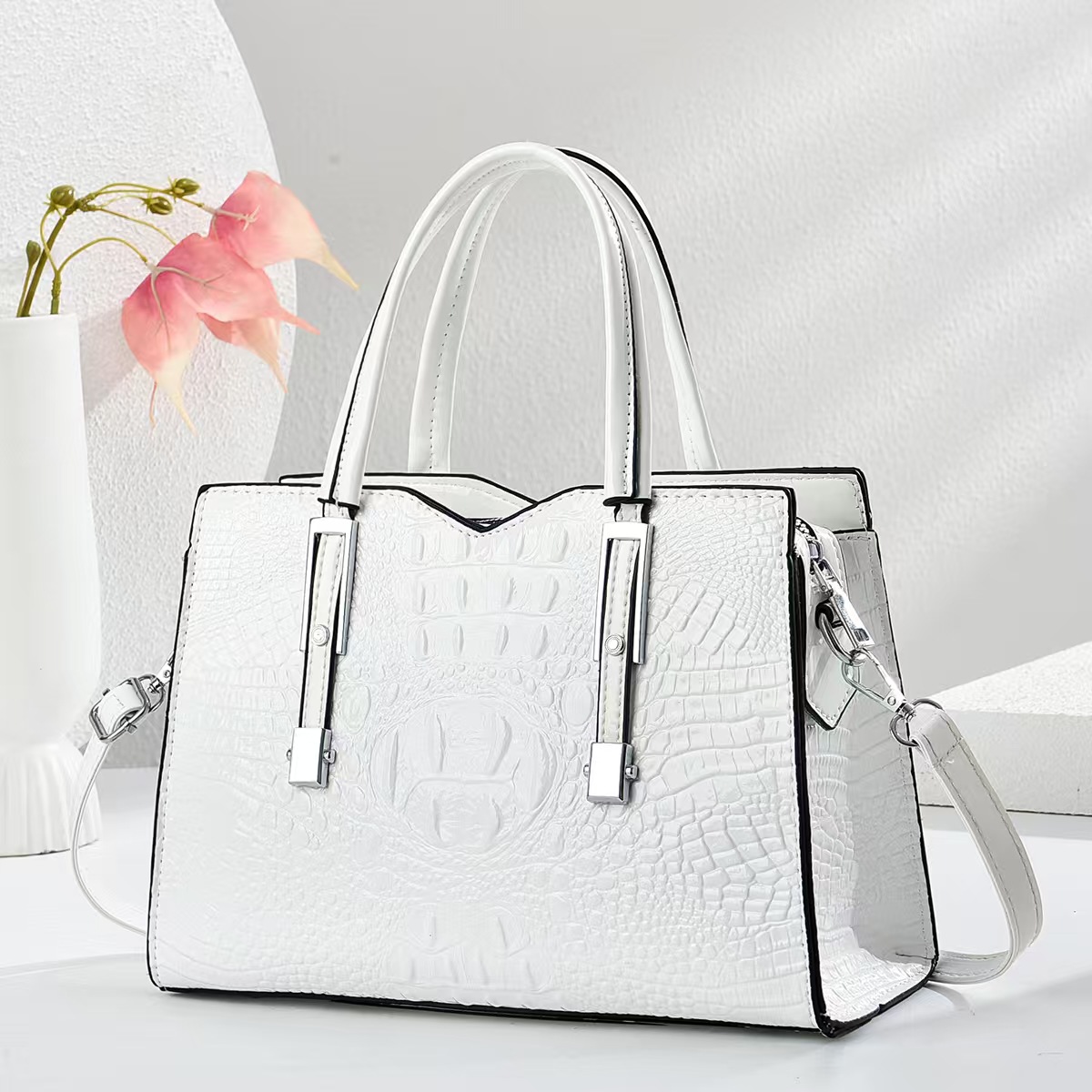 Emperor rinoceronte retro nicho bolso de mano mujer 2025 primavera y verano patrón de cocodrilo todo fósforo pequeño bolso de transporte nuevo