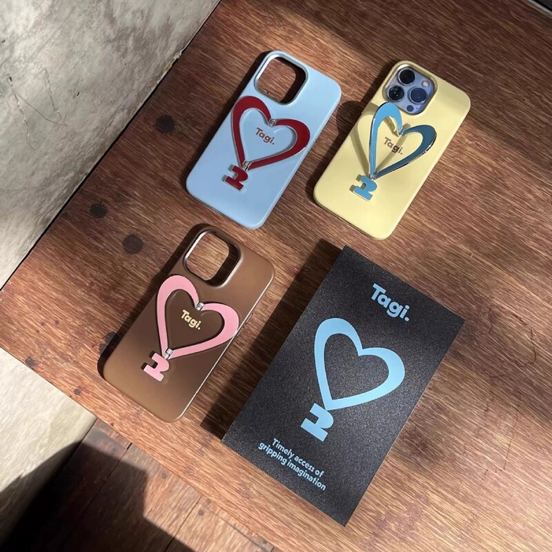Tagi.《Make People Happy》Metal Stand Leather Heart-Shaped Phone Case for iPhone 16 Pro Max, Anti-Fingerprint Tagi.《Make People Happy》Metal Stand Leather Heart-Shaped Phone Case for iPhone 16 Pro Max, Anti-Fingerprint