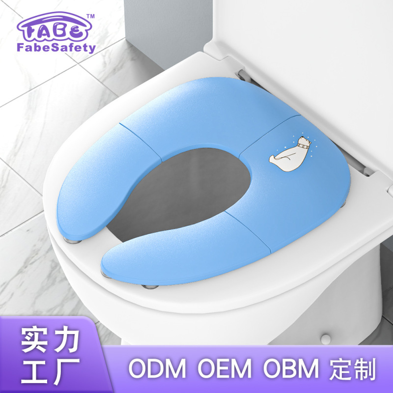 男女の赤ちゃんの折り畳み便器の蓋の子供の便器の輪は外出します。|undefined