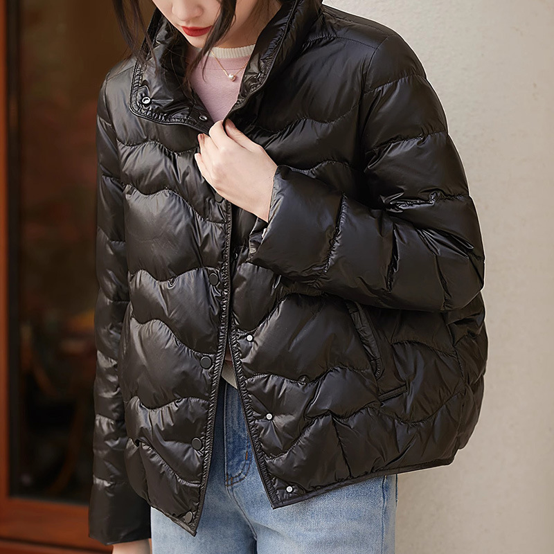 95白ガチョウの毛が薄くて短いです。痩せている繭型のダウンジャケット2025冬の新型の婦人服の上着のショートコートの女性です。