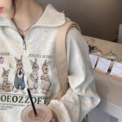 Polo襟半ファスナーの女性秋冬の新型小柄なゆったりとしたプリントのデザイン感があります。