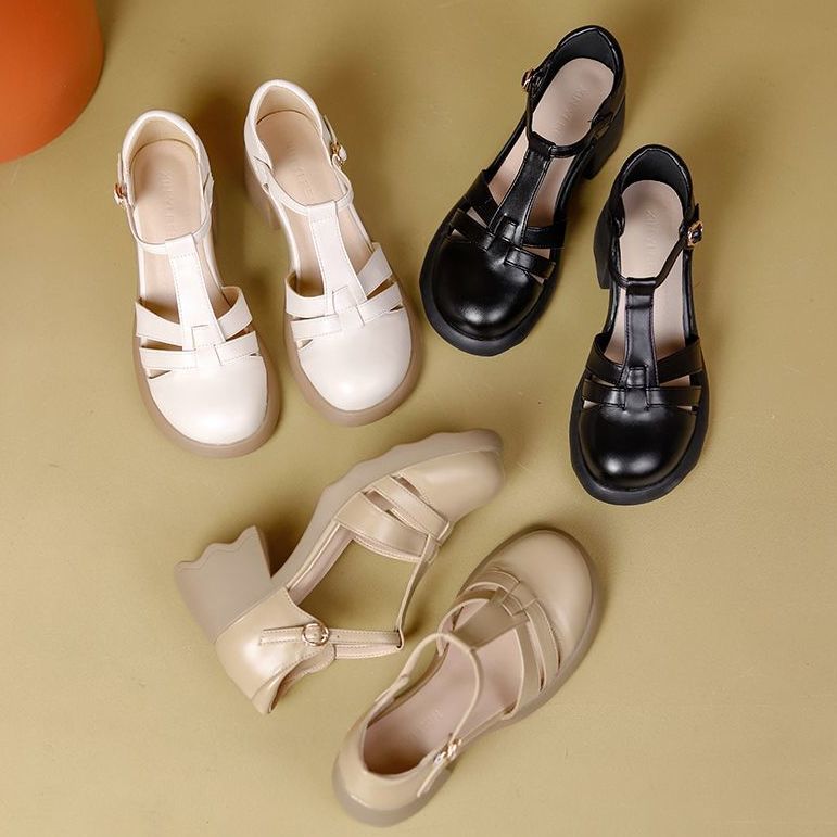 2024 verano nuevo retro botón de una sola palabra abierto superficial japonés agujero bolso de fondo suave sandalias romanas tacones gruesos