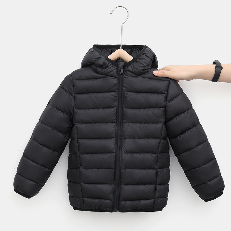 Comercio exterior otoño e invierno nueva chaqueta de algodón de plumón para niños de color sólido para hombres y mujeres, chaqueta de algodón cálida ligera con capucha para niños de mediana edad