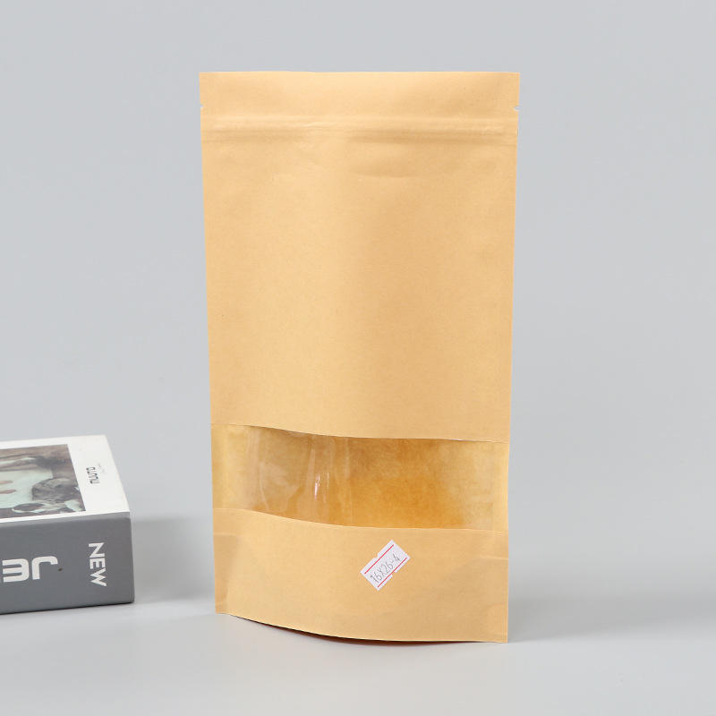 Spot bolsa de papel kraft con ventana transparente bolsa de embalaje de alimentos autosellada autoportante bolsa de té sellada de ocho lados fácil de rasgar