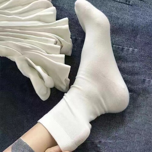 Socks for women ins fashion versatile solid color confinement socks spring and autumn versatile boneless socks simple style pile socks Japanese white