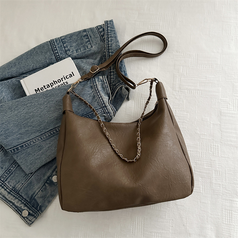 2024 bolso de estudiantes coreano para mujeres de gran capacidad nicho versátil bolso de hombro de alto nivel bolso de cubo de cadena