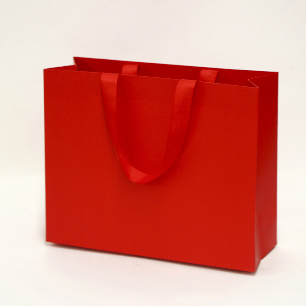 Bolsa de cartón blanco logotipo tienda de ropa bolsa de mano bolsa de regalo espesa bolsa de regalo de Navidad se puede imprimir