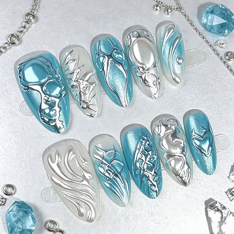 New European and American almond-shaped nail tips with liquid metallic lines, creating a three-dimensional, embossed effect; these are detachable nail tips New European and American almond-shaped nail tips with liquid metallic lines, creating a three-dimensional, embossed effect; these are detachable nail tips