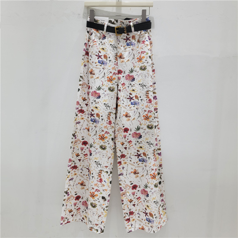 El nuevo verano de 2026 es popular este año, casual, estampado en color, flores rotas, estilo extranjero relajado, tubo recto, pantalones de piernas anchas.