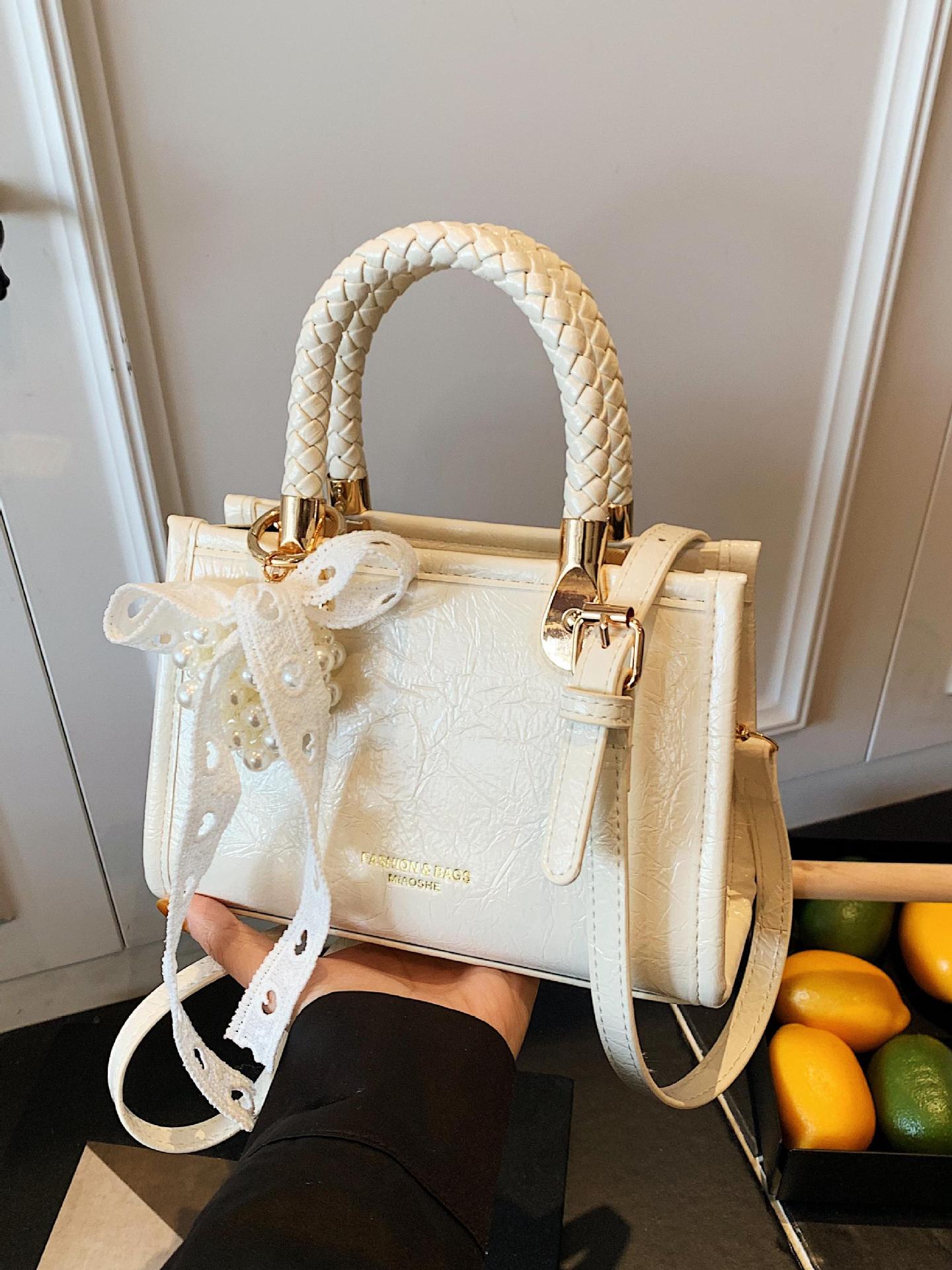 Bolso cuadrado pequeño portátil más vendido transfronterizo para mujer 2025 nuevo bolso de hombro de moda de nicho bolso de mensajero de alta gama