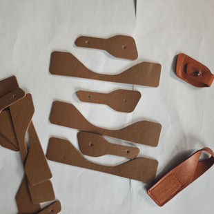 Clothing Accessories Production and Sales, Jewelry Accessories, Buckle Tabs, Leather Labels, Leather Tags, Leather Handles, Small Leather Goods Manufacturers, Leather Tabs and Waist Tabs