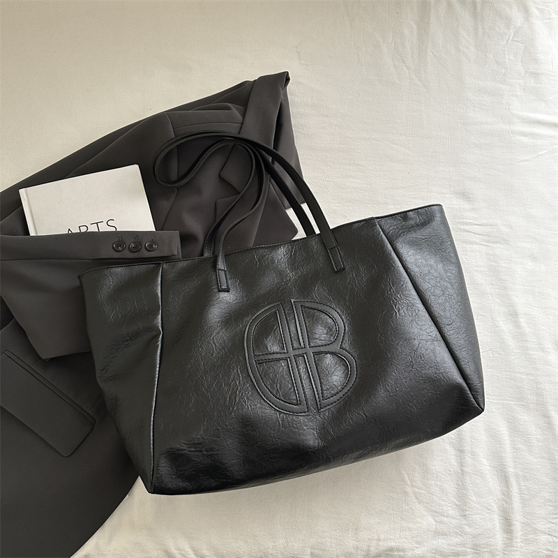 Bolso de mano de dama de alto nivel primavera y verano 2025 versátil bolso de viaje en bolsa popular de gran capacidad este año