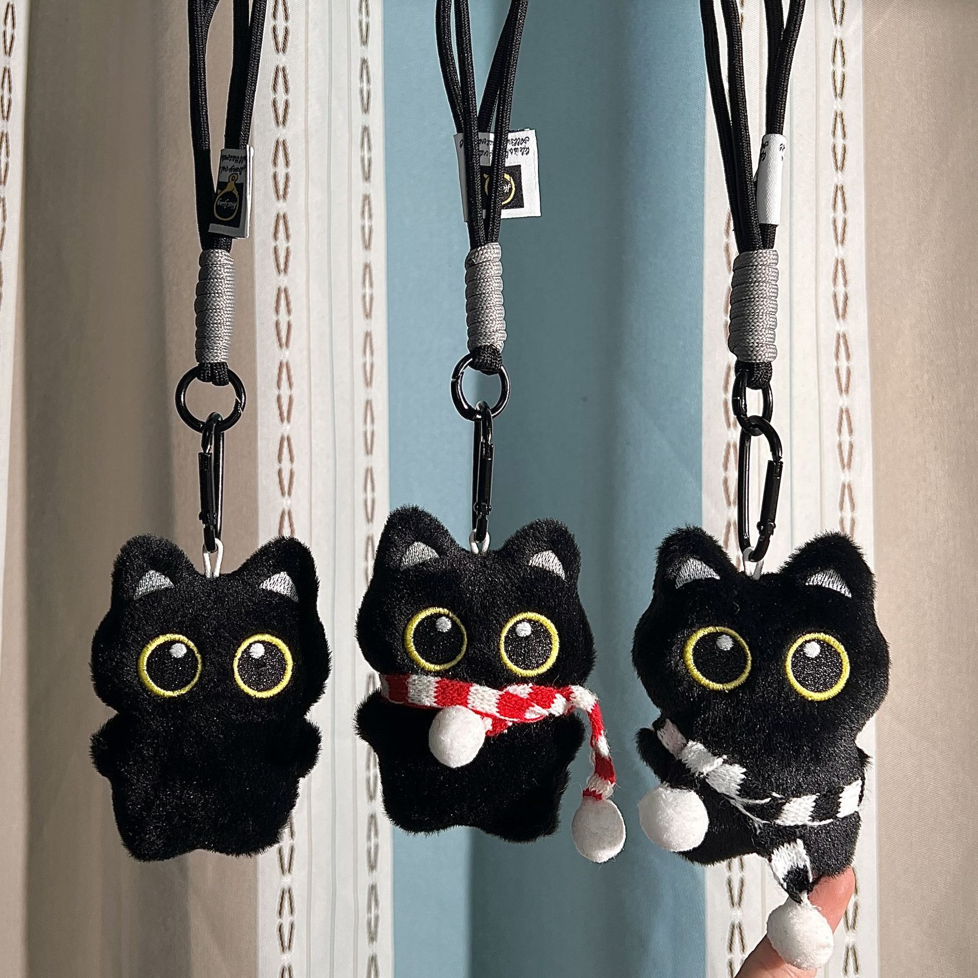 Muñecas chirriantes juguetes para niños accesorios de peluche colgantes llaveros de automóviles muñecas gatos al por mayor