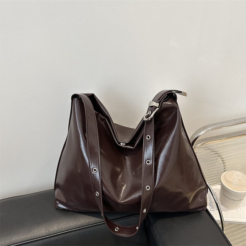 2025 nueva bolsa de hombro suave casual minimalista estilo coreano de personalidad para mujeres gran capacidad bolsa de mano mochila