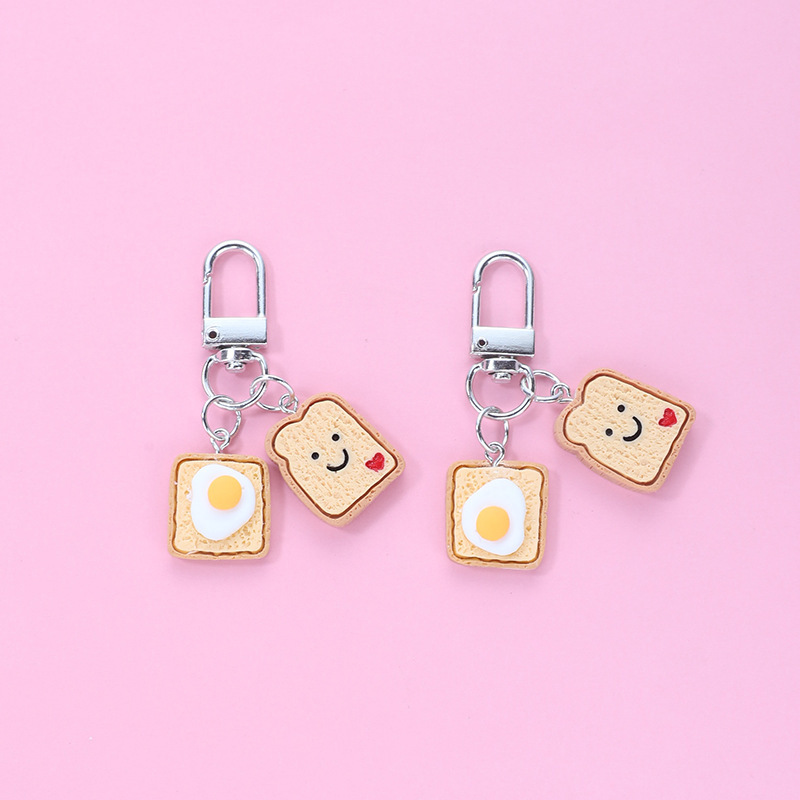 Poached egg bread pendant bag hanging mobile phone pendant zipper buckle pendant airpods protective case earphone case pendant Poached egg bread pendant bag hanging mobile phone pendant zipper buckle pendant airpods protective case earphone case pendant