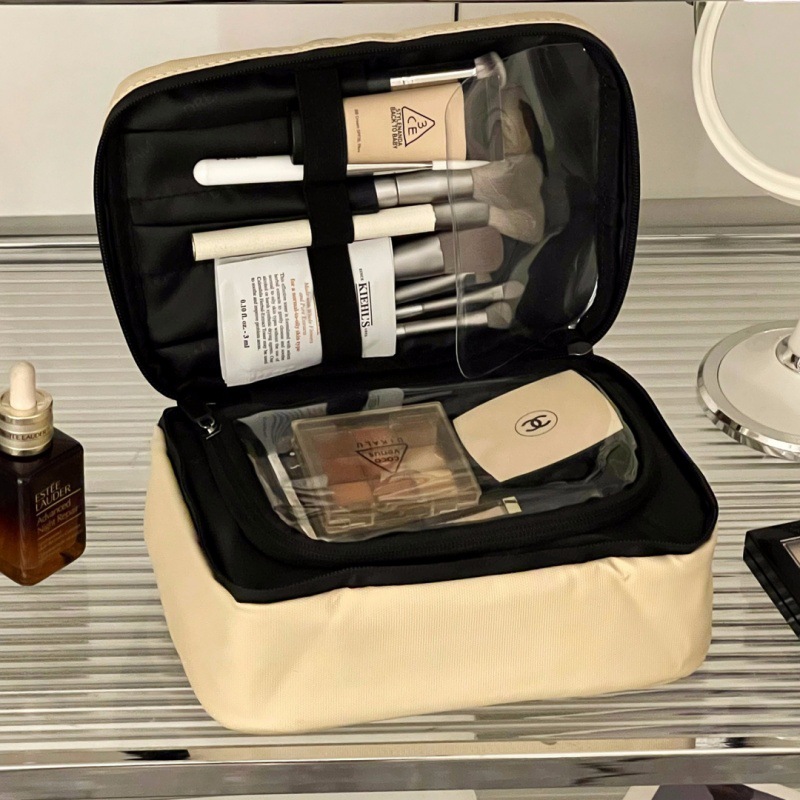 2024 nueva bolsa de cosméticos pu simple moda partición impermeable bolsa de almacenamiento de cosméticos bolso al por mayor de la fábrica