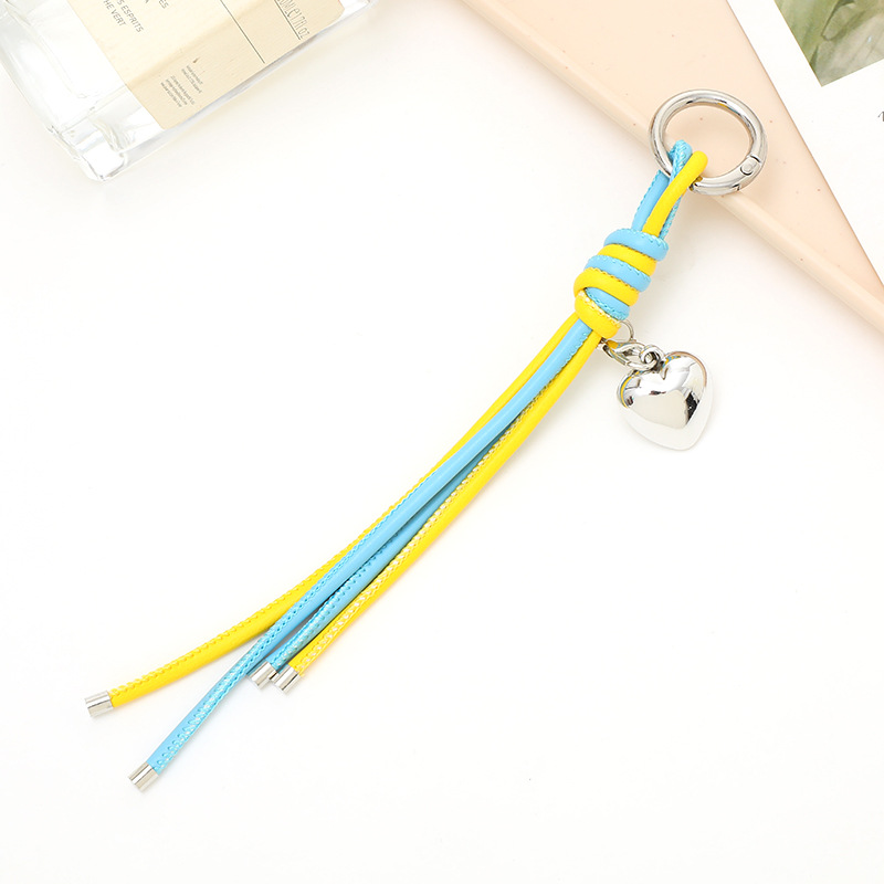 Nuevo tipo de cuerdas de cuero PU llavero colgante in bolsos de moda colgante cadena accesorios DIY tejido a mano