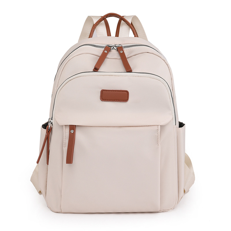 Bolsos para mujer 2023 nueva mochila casual para mujer de nailon moda todo fósforo color de contraste mochila ligera mochila escolar al por mayor