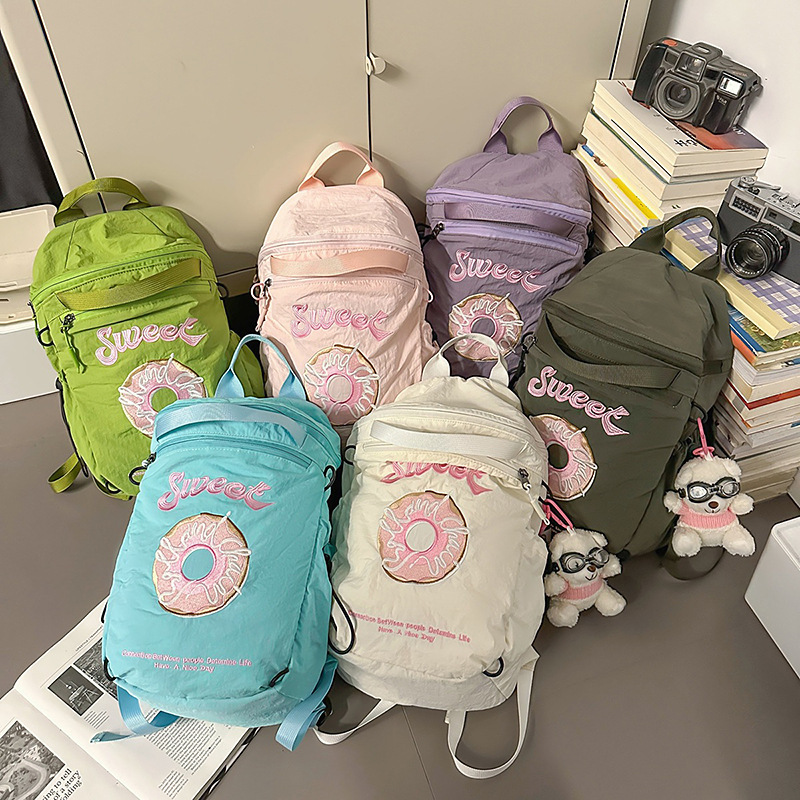 小型軽量ドーナツ刺繍巾着バッグ、小さくて可愛らしいリュックサック、アウトドア旅行やレジャーに最適なバックパック|undefined
