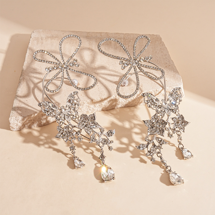 Súper destello y luz, estilo de lujo, mariposa con incrustaciones de diamantes, gotas de agua, orejas huecas, sin perforaciones, personalidad, temperamento de nicho, pendientes de sentido avanzado, mujeres
